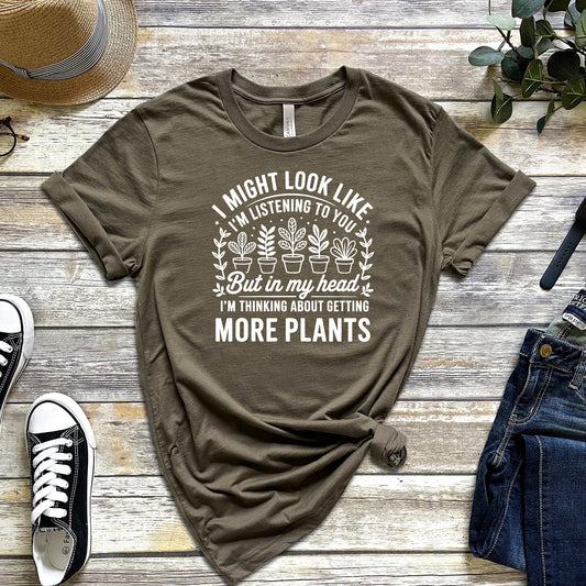 I MIGHT LOOK LIKE IM LISTENING TO YOU BUT IN MY HEAD I'M THINKING ABOUT GETTING MORE PLANTS