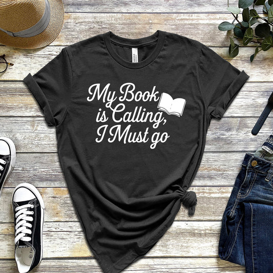 MY BOOK IS CALLING, I MUST GO