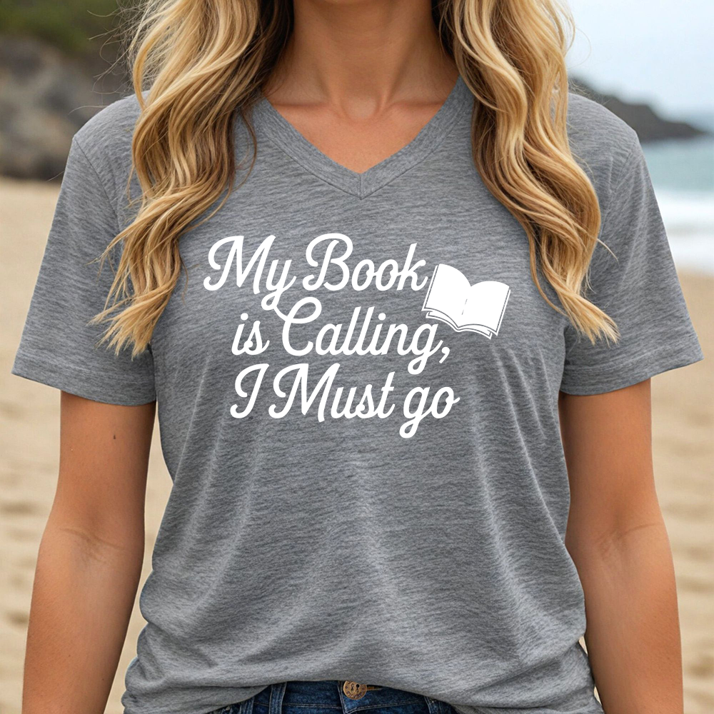 MY BOOK IS CALLING, I MUST GO (V-NECK)